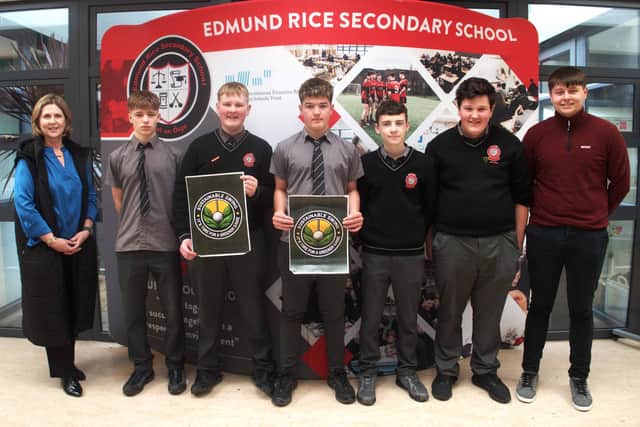 Judge Tina Mulhearne of Tipperary Local Enterprise Office with the winners of hte Best Innovation & Concept award One Link, a business management tool company run by Sean Flynn, Oisín Hayde and Evan Walsh. ERSS teacher Ronan Guilfoyle is pictured on far right.
