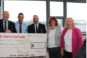 Cashel Rugby Club officials made a presentation of €1,000  to Scoil Cormaic before the game