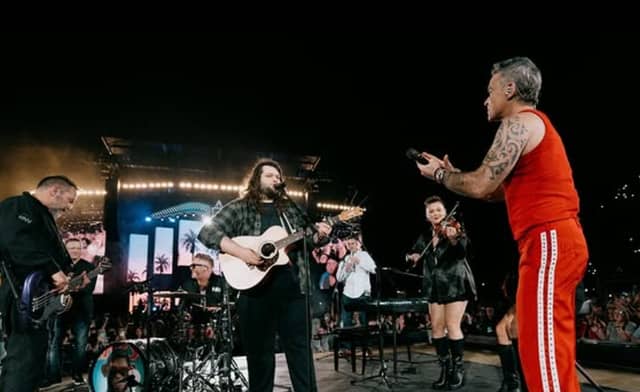 Fans were ecstatic to see Garron Noone perform alongside Robbie Williams at Croke Park amid his recent battles with mental health | PICTURE: Instagram/@robbiewilliams