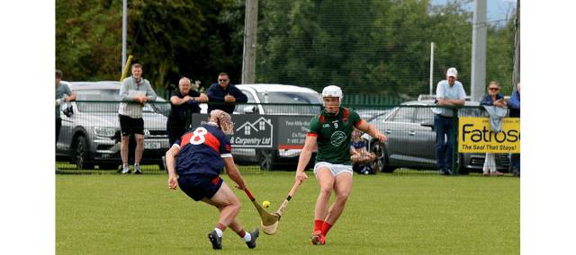 Mullinahone's Sean Curran (left) and Cathal Quinn, Cashel King Cormacs, in a scrap for a loose ball.Picture: Michael Boland