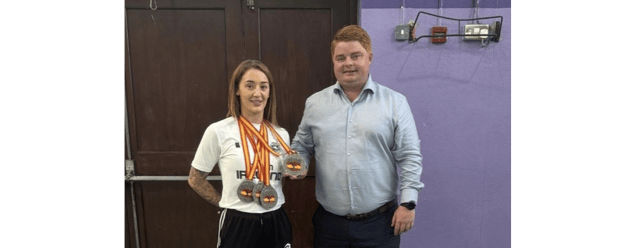 Shannon Strawbridge is congratuated by Cllr John O’Heney at the Canon Hayes Recreation Centre in Tipperary Town