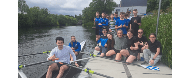Daire Lynch with junior rowers at Clonmel Rowing Club