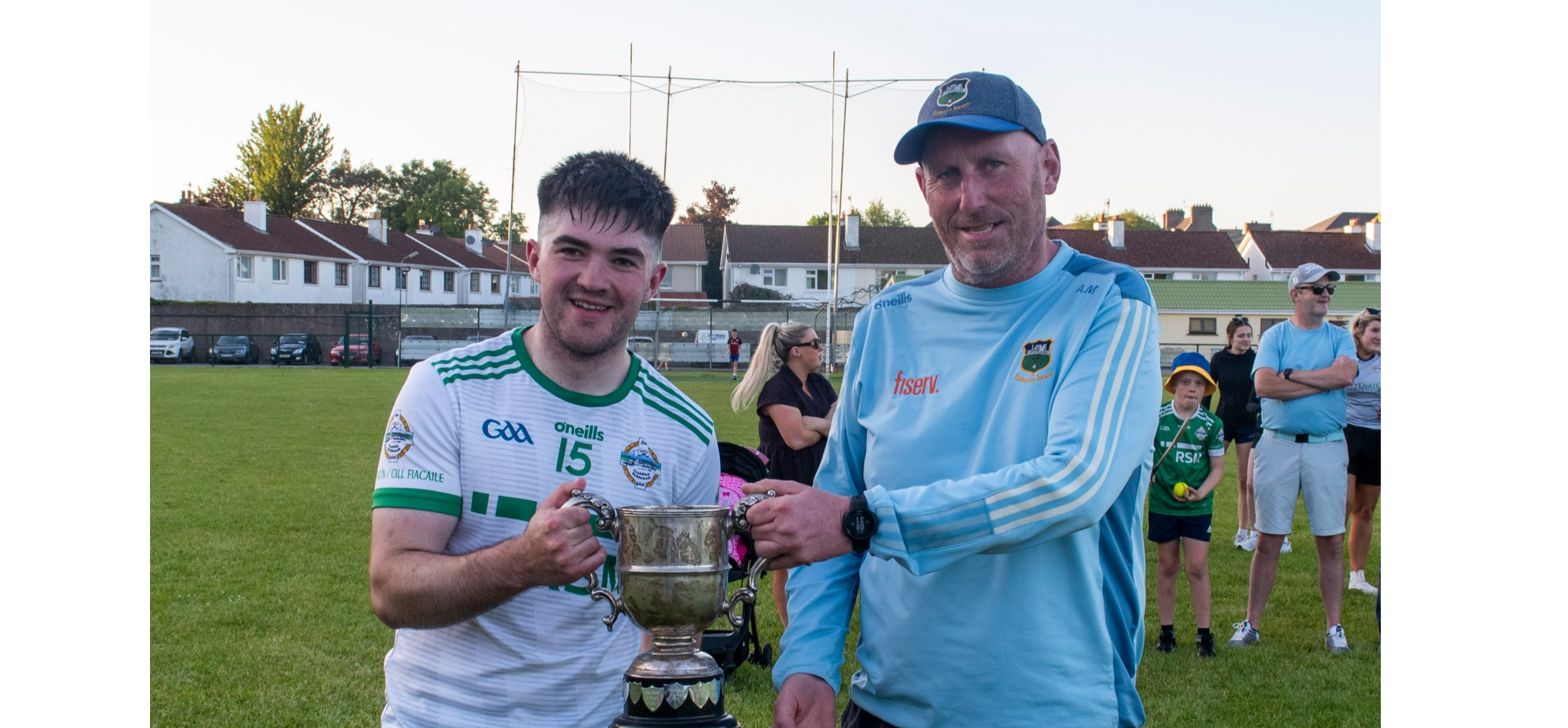 Golden Kilfeacle captain Ben Currivan accepts the Tipperaryman’s Cup from Alan Moloney, Secretary of the Tipperary County Football Committee. Picture: Michael Boland