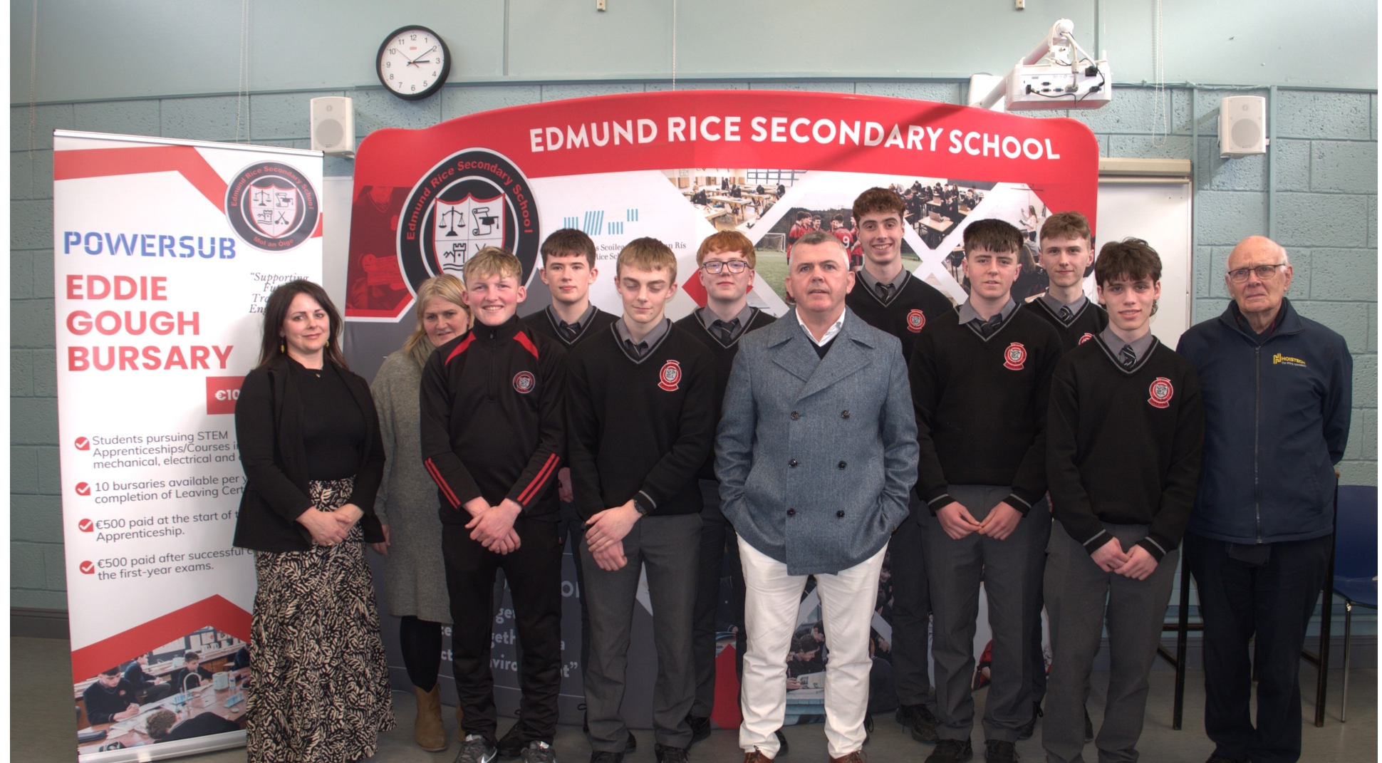 Eddie Gough of POWERSUB (front centre) with Edmund Rice Secondary School students, careers teacher Aileen O'Keeffe, Principal Majella Gleeson (far left) and retired teacher Noel  Casey (far left)