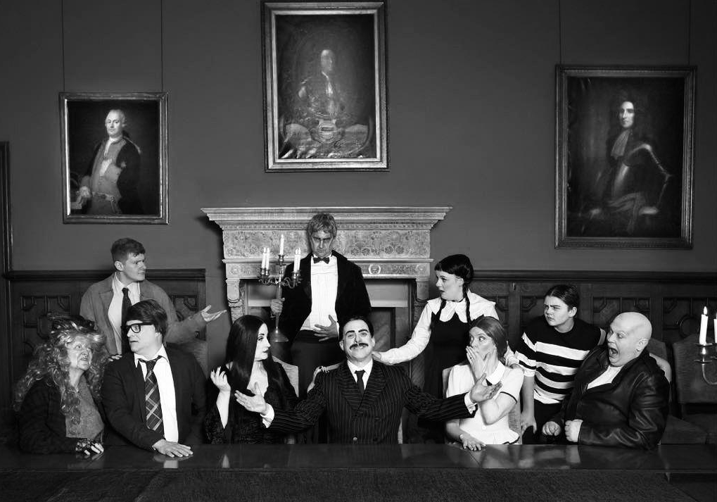The Addams Family cast members gather around the table at Gurteen de La Poer Castle in Kilsheelan . Photo John Murphy