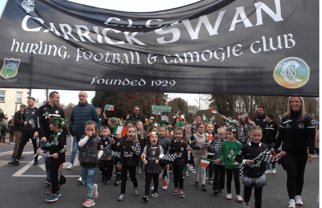 Young Carrick Swan GAA Club members taking part in Carrick-on-Suir's St Patrick's Day Parade
