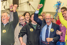 Newly elected TD Seamus healy celebrates at the count centre with members of his campaign team