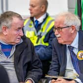 Seamus Healy in discussion with a campaign team member