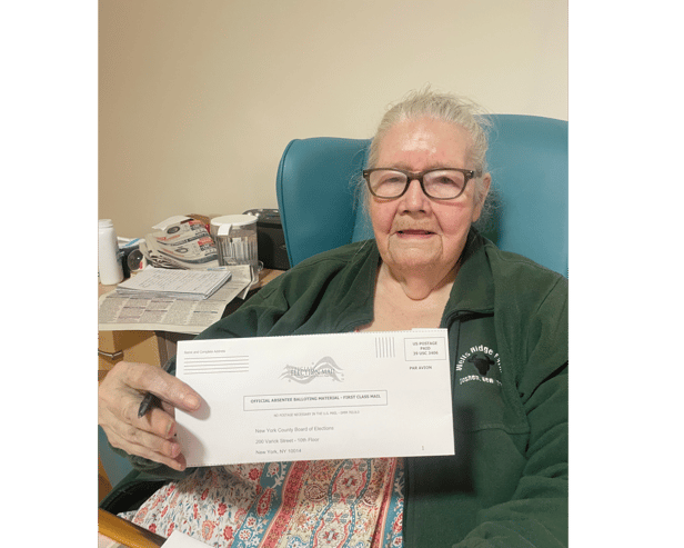 New York born Maureen Power proudly showing her US Presidential election postal ballot