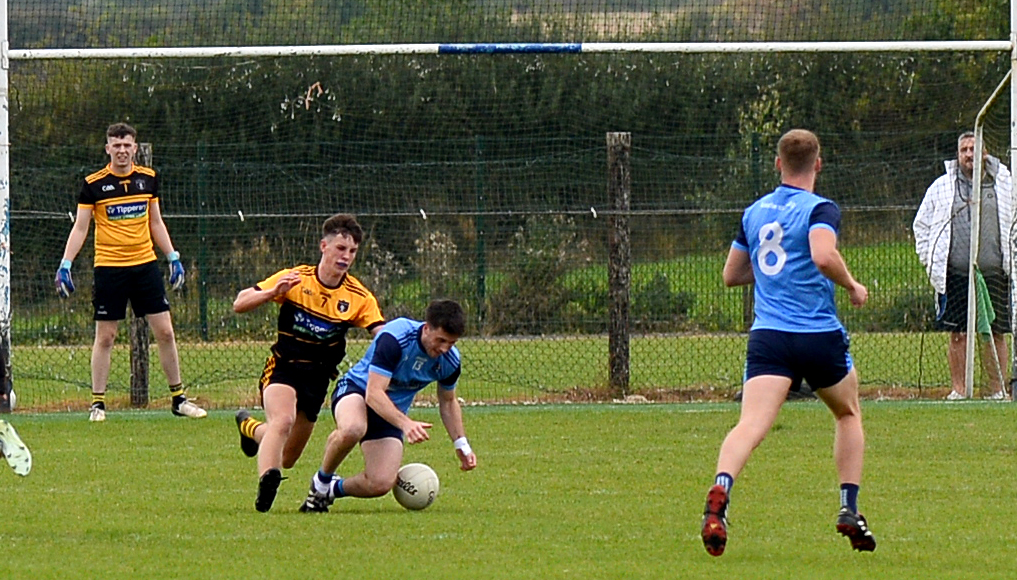 Moyle Rovers' Dara Ryan comes under pressure from Arravale Rovers' Brendan Delaney. Picture: Michael Boland