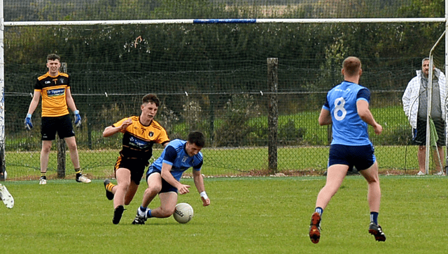 Moyle Rovers' Dara Ryan comes under pressure from Arravale Rovers' Brendan Delaney. Picture: Michael Boland