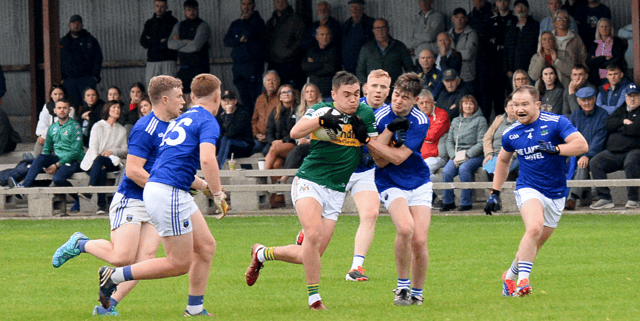 Peter McGarry, Clonmel Commercials, holds onto the ball despite being outnumbered by Ballina players. Picture: Michael Boland