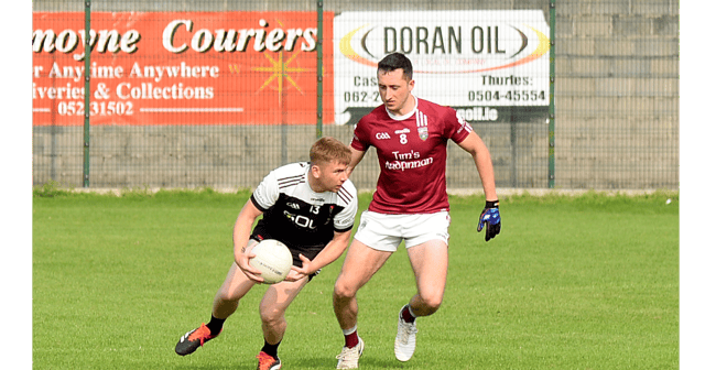 Lyndon Fairbrother, JK Brackens, sizes up his options against Ardfinnan's Sean Nagle. Picture: Michael Boland