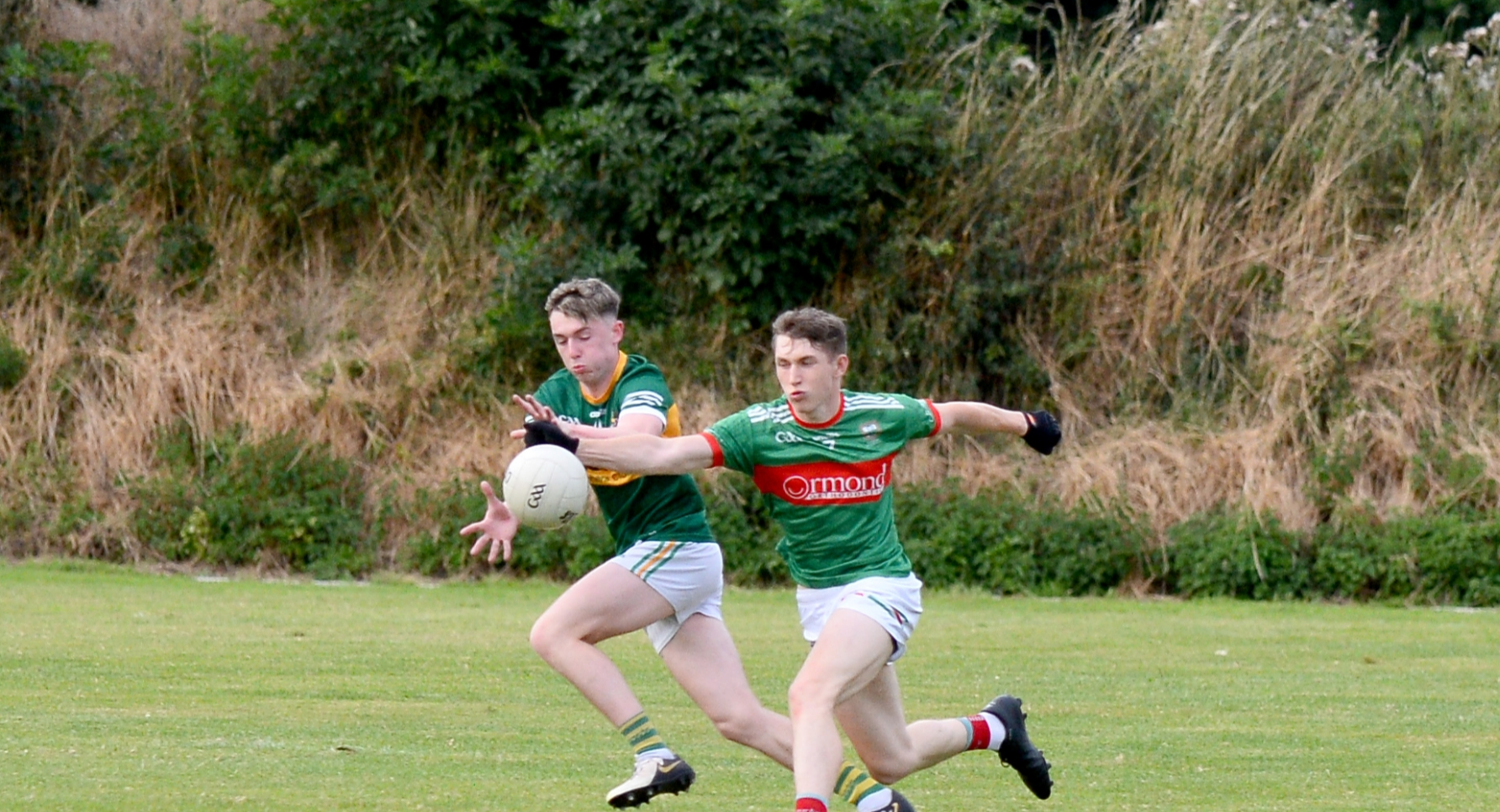 Cian Smith, Clonmel Commercials (left) and Loughmore Castleiney's Eoin O'Connell in action during the game in Clonoulty. Picture: Michel Boland