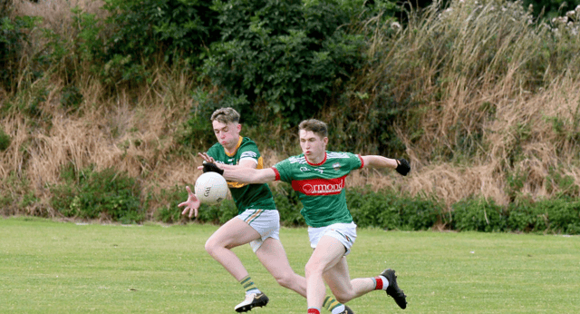 Cian Smith, Clonmel Commercials (left) and Loughmore Castleiney's Eoin O'Connell in action during the game in Clonoulty. Picture: Michel Boland