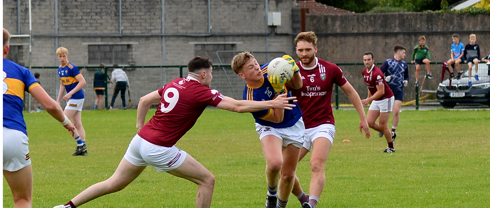 Liam Freaney, Kilsheelan Kilcash, tries to evade the challenge of Ardfinnan's Gerry Cronin. Picture: Michael Boland