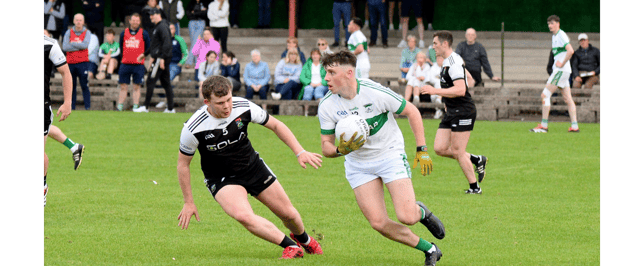 Paudie O'Shea, Grangemockler/Ballyneale (right) sizes up his options against Stephen Cahill, JK Brackens. Picture: Michael Boland