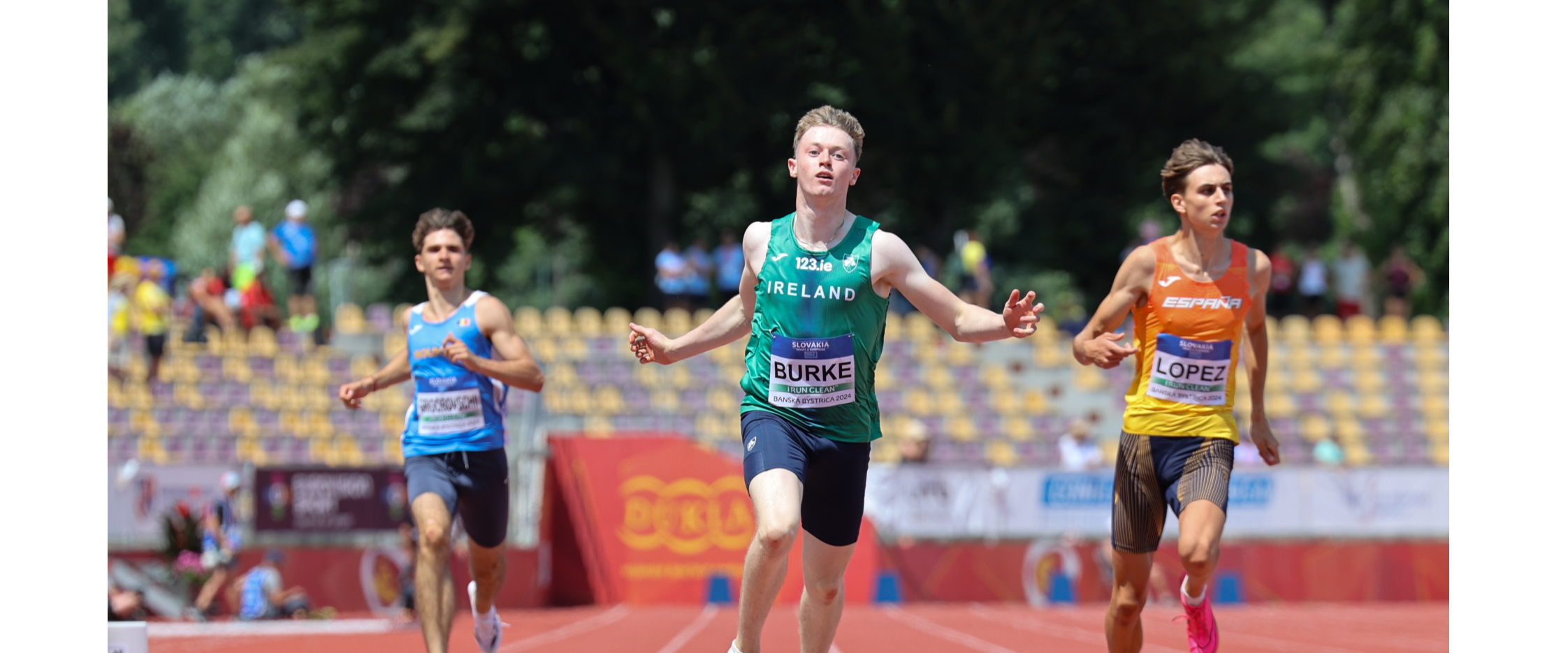 Joe Burke (centre) broke the Irish Under 18 200 metres record when winning the European bronze medal