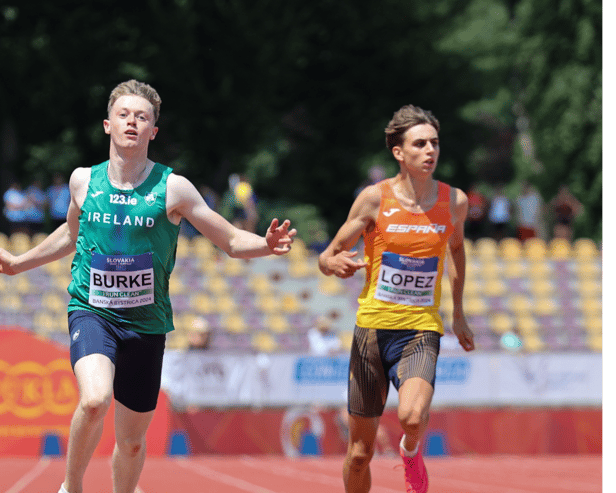 Joe Burke (centre) broke the Irish Under 18 200 metres record when winning the European bronze medal