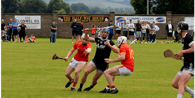 Carrick Swan's Eric O'Halloran is surrounded by Killenaule's Killian O'Dwyer (left) and Joe O'Dwyer during the Clonmel Oil South Tipperary Senior Hurling final. Picture: Michael Boland