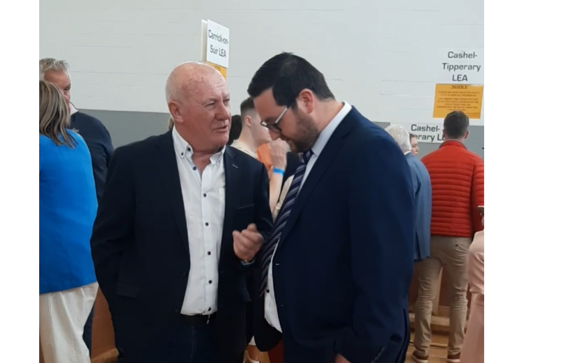 Re-elected Carrick-on-Suir LEA councillors Kieran Bourke (FF) and Mark Fitzgerald (FG) in deep discussion during the count in Thurles