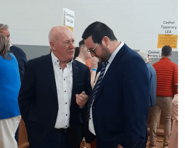 Re-elected Carrick-on-Suir LEA councillors Kieran Bourke (FF) and Mark Fitzgerald (FG) in deep discussion during the count in Thurles