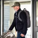 Football pundit Roy Keane told a court he was left ‘in shock’ after being allegedly ‘headbutted’ through doors during a Premier League match (James Manning/PA)