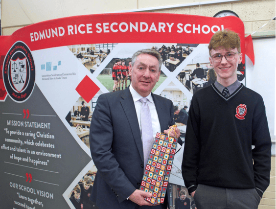 A presentation is made to MEP Billy Kelleher by student Paul Keane, on behalf of the teachers and students, in appreciation of his visit to Edmund Rice Secondary School in Carrick-on-Suir