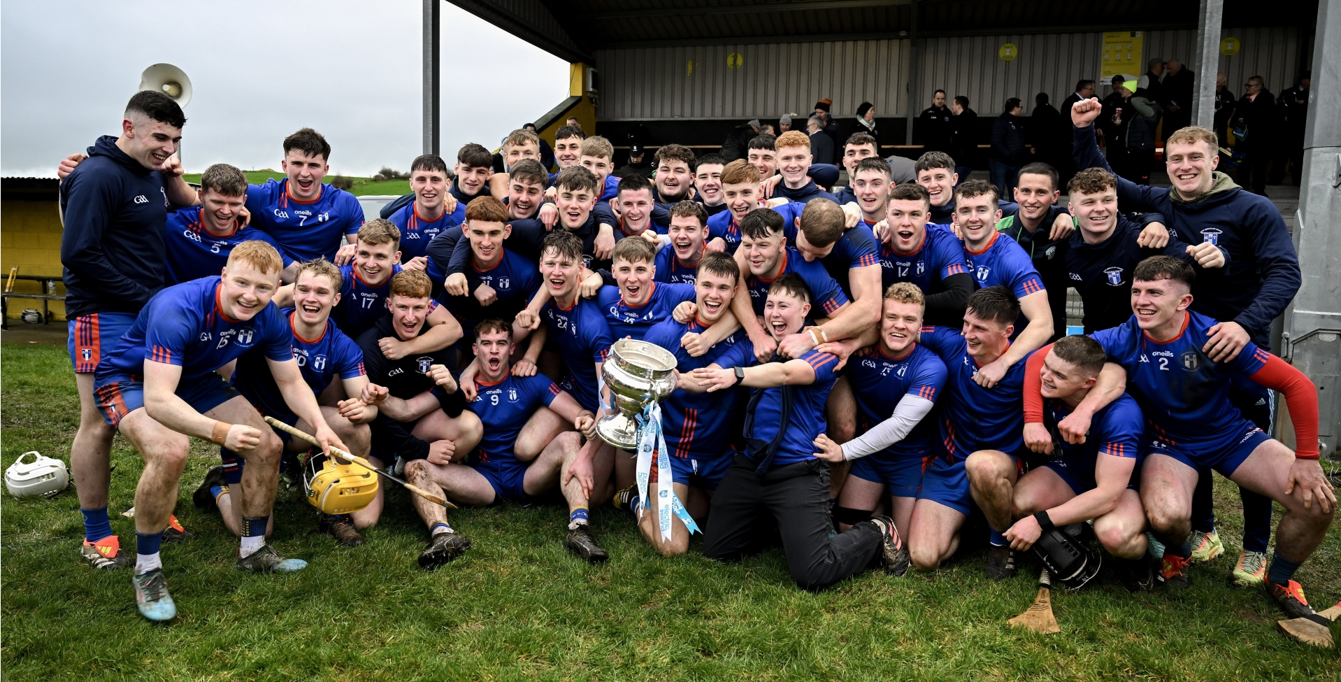 The Mary Immaculate College Limerick squad celebrate with the Fitzgibbon Cup after their exciting final victory over UL at Abbeydorney on Saturday | PICTURE: Sportsfile