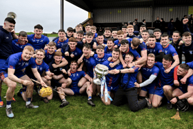 The Mary Immaculate College Limerick squad celebrate with the Fitzgibbon Cup after their exciting final victory over UL at Abbeydorney on Saturday | PICTURE: Sportsfile