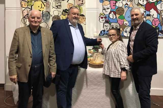 Mathúin Ó Caoimh, John McCarthy, Méabh Purcell (former student who made the anniversary cake) and Charlie McGeever. Méabh and John did the duties of cutting the fabulous cáca milis.