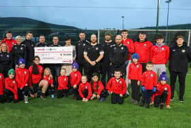Members of Moneygall FC accept the cheque for €10,000  as part of Circle K’s €100,000 giveaway to grassroots football clubs in the Republic of Ireland