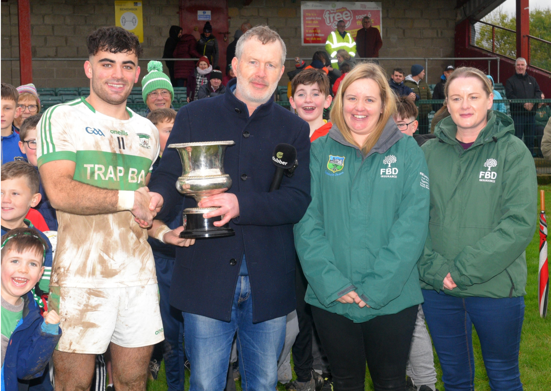 Grangemockler/Ballyneale captain Mark O'Meara accepts the cup from Conor Ryan, chairman Tipperary Football Board, in the presence of Annemarie Morton and Grainne Keating FBD. Pic: Michael Boland