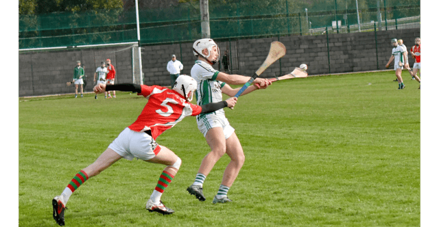 Mullinahone's Alex Britton tries to block this shot by Robbie Ryan, Holycross/Ballycahill, in Sunday's final. Picture: Michael Boland