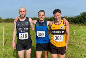 The first three men home in the Co Intermediate  Cross Country Championship at Moyne: Louis Rice, Fethard AC (third), Dermot Gorman, Carrick-on-Suir AC (first) and Barry Hartnett Dundrum AC (second)