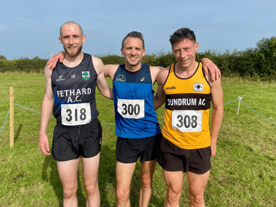 The first three men home in the Co Intermediate Cross Country Championship at Moyne: Louis Rice, Fethard AC (third), Dermot Gorman, Carrick-on-Suir AC (first) and Barry Hartnett Dundrum AC (second)
