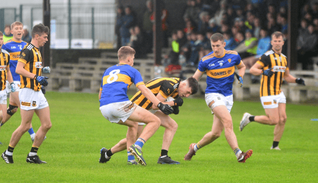 Keith Ryan, Upperchurch/Drombane, is tackled by Michael Freaney, Kilsheelan/Kilcash. Picture: Michael Boland