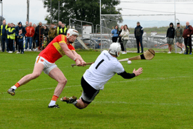 Carrick Swan goalkeeper Kieran Lonergan makes a great save from Killenaule's Mark Stakelum. Picture: Michael Boland