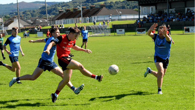 Action from Sunday's Tipp SFC game in Clonmel between Ballyporeen and Moyle Rovers. Bally's Darragh Brennan gets his shot off despite the attempted block down of Luke Boland. Pic: Michael Boland
