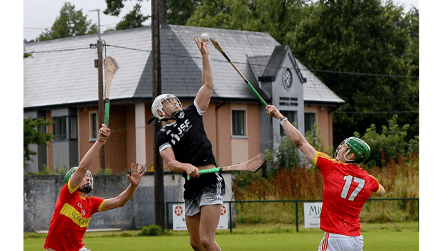 Carrick Swan's Jamie Holloway reaches for a high ball during Saturday evening's Clonmel Oil South Tipperary Senior Hurling Championship final against Killenaule at Clonmel. Picture: Michael Boland