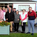 Brian King ( CEO Thurles Credit Union ) and Amanda Ryan ( Chairperson Thurles Credit Union) with Moyne Road Residents last week to celebrate the arrival of the 8 new planters.