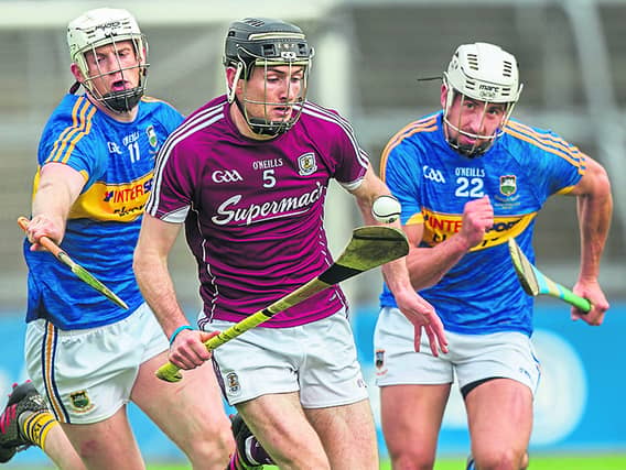 Tipperary’s Michael Breen and Patrick Maher pictured chasing Galway’s Pádraig Mannion.