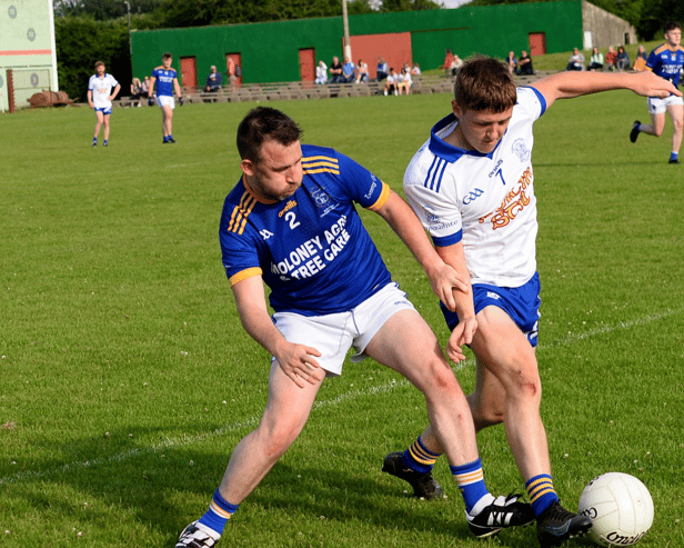 Ballylooby/Castlegrace’s Ger Beary (left) and Cappawhite’s Jack Armshaw in a scrap for possession. Picture: Michael Boland
