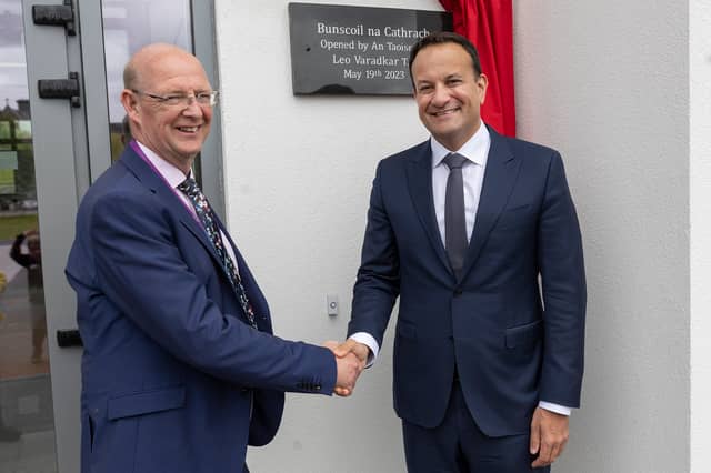 Bunscoil na Cathrach Principal Brendan Horan shakes Taoiseach Leo Varadkar's hand after he unveiled a commemorative plaque at the opening ceremony. Pic. John D Kelly