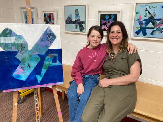 Clonmel based artist Marine Kearney with her daughter Cailín at her 'Conversations / Cómhrá ' exhibition of paintings. ( Photograph: Pádraig Ó Flannabhra /Photoart)