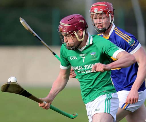 Drom & Inch's Liam Ryan pictured racing away from Kiladangan's Sean Hayes at Templederry on Saturday evening. Picture: Bridget Delaney