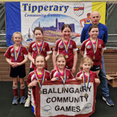 The victorious Ballingarry Girls under 10 indoor soccer team including Ciara Boylan, Saoirse Cahill, Holly Dormus, Hannah Leahy, Jane O’Donnell, Grace O’Gorman and Roisin Rice. With Micheál Maher.