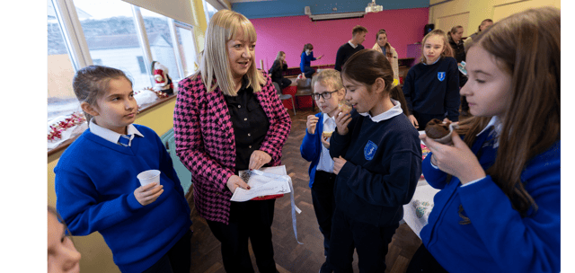 Ukrainian pupils Diana Kucherak, Mariia Rastorhuievaa, Liuda Soloviova and Yelzavela Bratseen chatting with school principal Louise Tobin at St Joseph’s primary school in Tipperary Town. picture: john