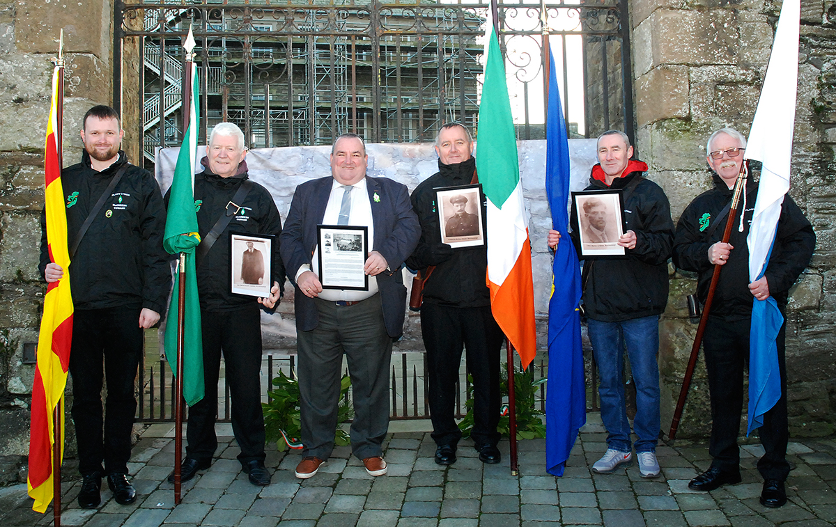 Deputy Martin Browne pictured with members of the colour party at the event on Sunday