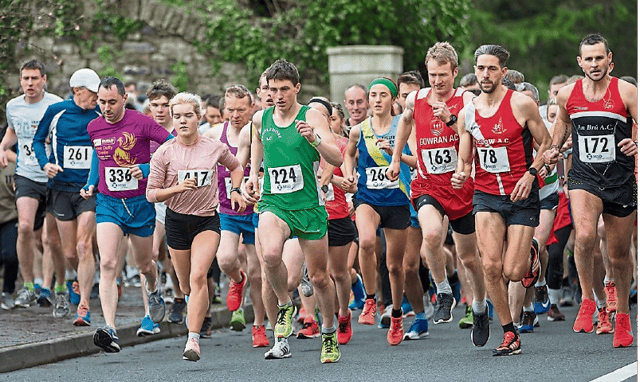 Athletes jockey for positions at the start of the MSD Four Mile Road Race in Clonmel - Photo - John D. Kelly